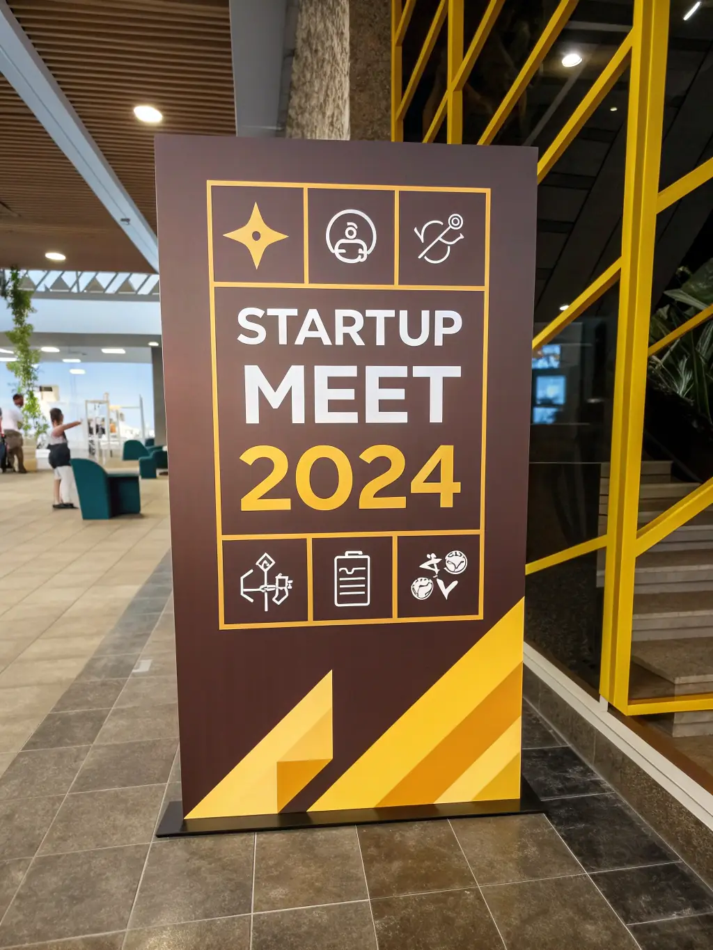 A schedule graphic for the 'Startup Meet 2024' conference, highlighting workshops, pitch sessions, and networking events.
