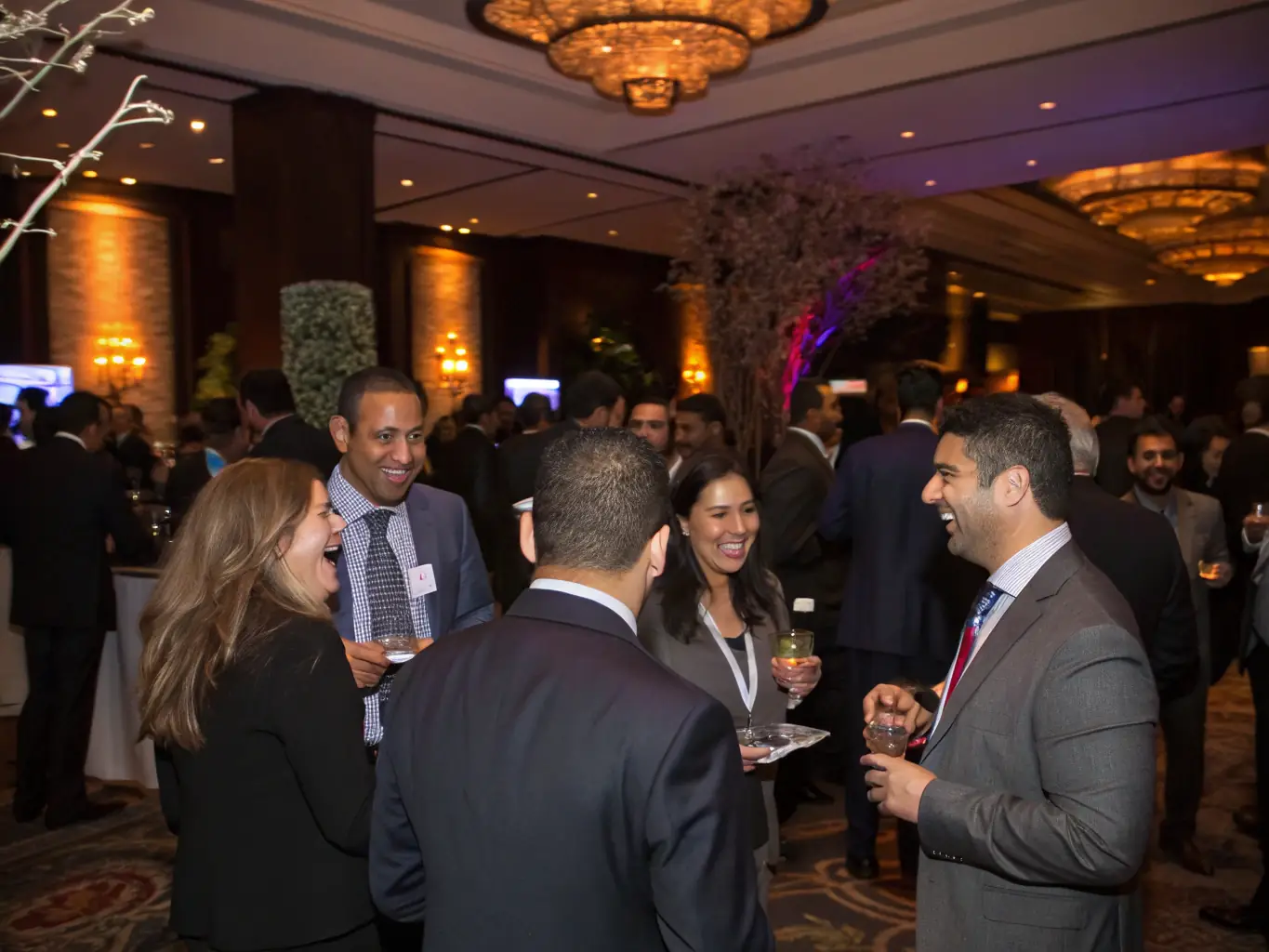 A professional photograph of a corporate gathering in Delhi, India, featuring keynote speakers and networking opportunities.